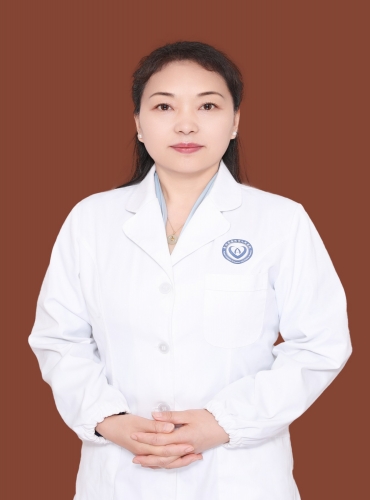 张定美
